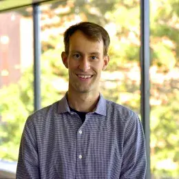 Matthew Picard Fraser  in blue shirt