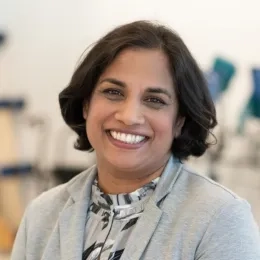 Professional portrait of Keshrie Naidoo, Doctor of Physical Therapy faculty member