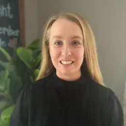 Caitlin Riley in black shirt
