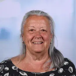 profile photo of patricia, she is tan with shoulder length silver grey hair