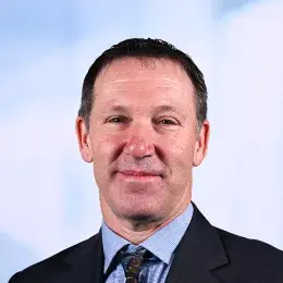 doug has a suit and tie on