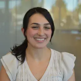 eliana in a white top