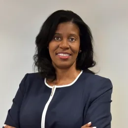Professional headshot of woman in business attire