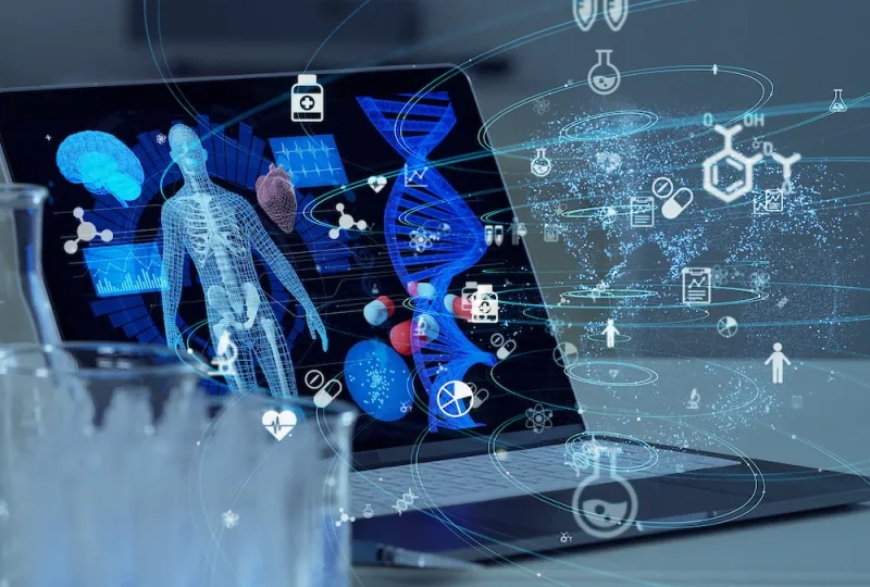 laptop with skeleton and illustrations of molecules