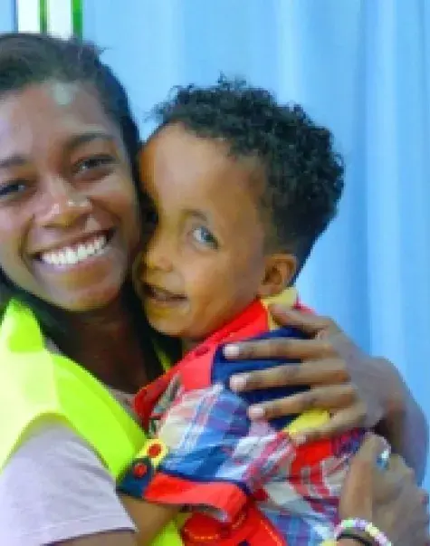OTD student Bria Mitchell-Gillespie with a client in Jordan.
