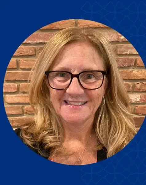 profile photo of ann she wears black rimmed glasses